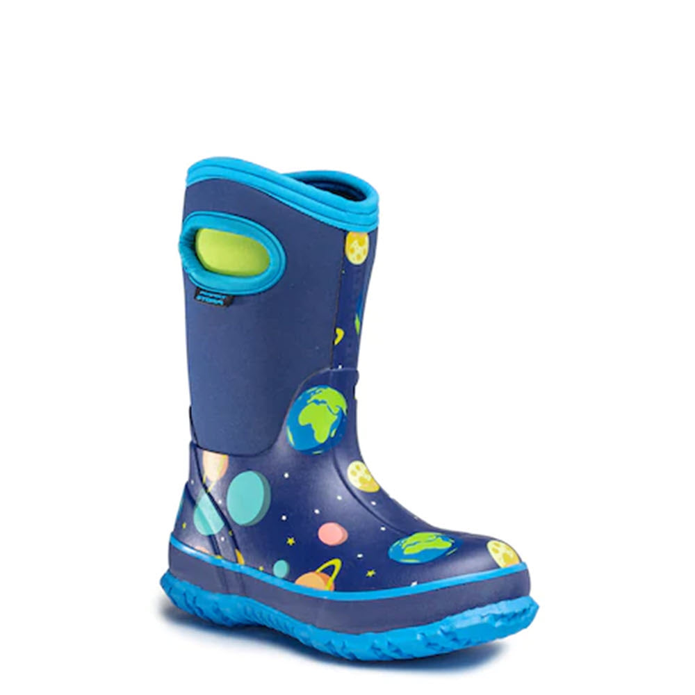 Child&#39;s blue snow boot featuring a colorful space print with planets and stars, equipped with a handle on the side is the PERFECT STORM CLOUD HIGH SPACE - KIDS by Perfect Storm.