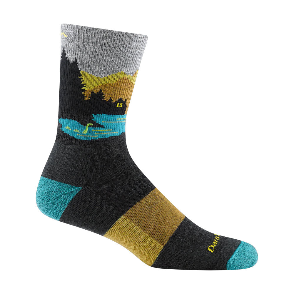 A single Darn Tough Close Encounters micro crew sock featuring a scenic outdoor design with trees, hills, and a moon in yellows and blues, against a gray background. The heel and toe are turquoise, and the brand name is at