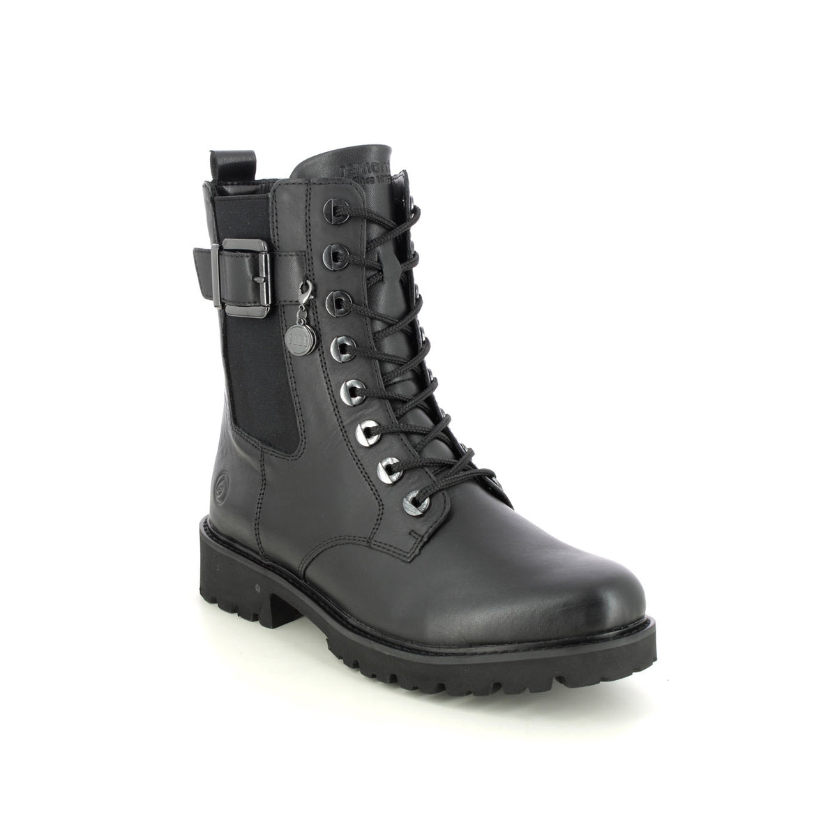 Remonte black leather combat boot with adjustable laces and a buckle, featuring a round emblem on the side, photographed on a white background.