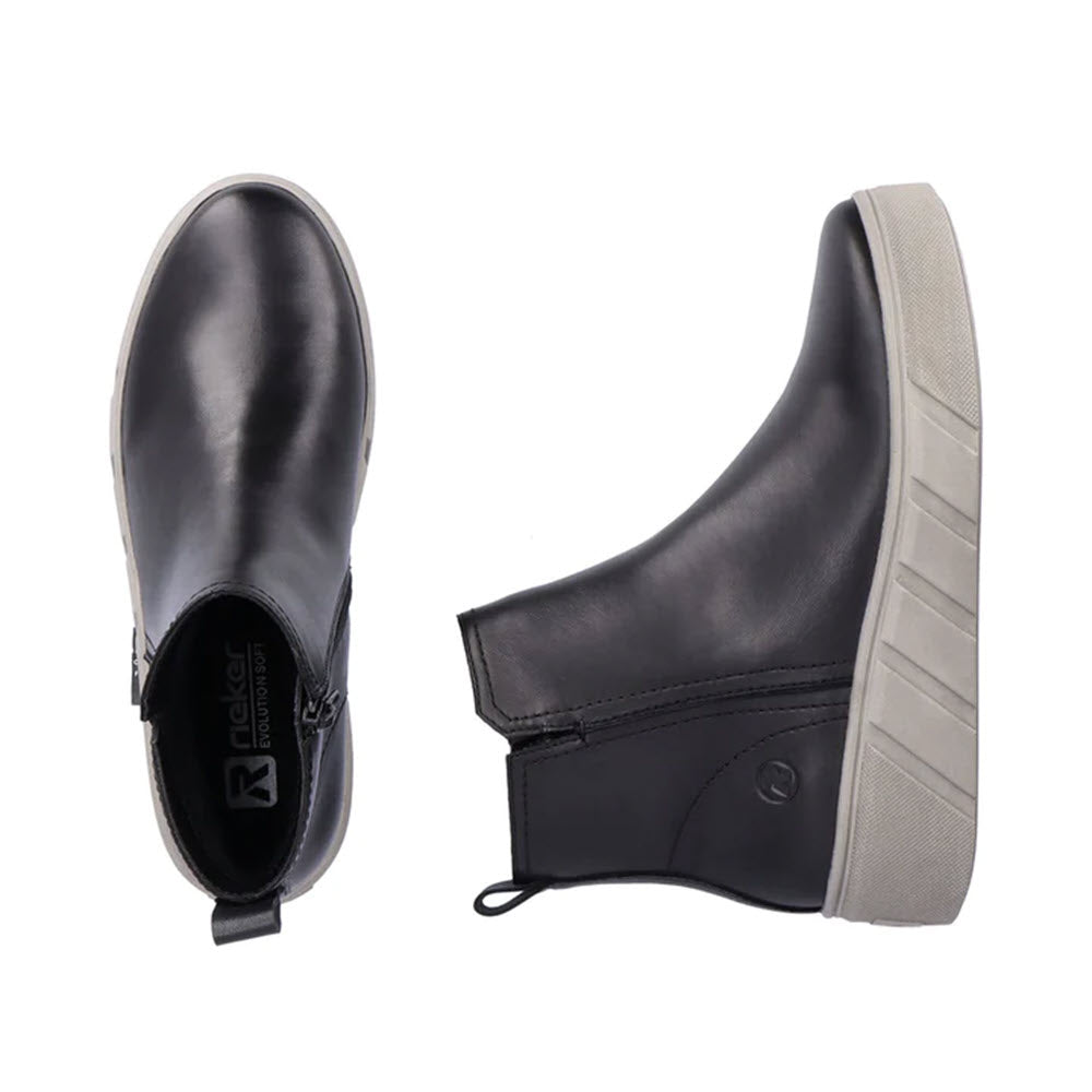 A pair of Revolution Platform City Chelsea black and grey ankle boots with elastic side panels, removable memory foam insole, and thick rubber soles, shown from top and side views against a white background.