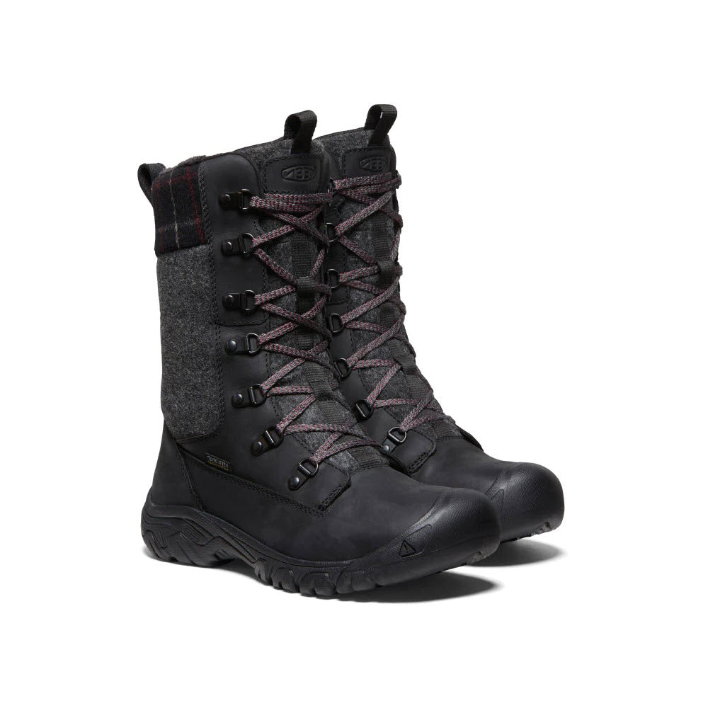 A single Keen Greta Tall boot in black with 200g insulation, gray wool ankle padding, and purple laces against a white background.