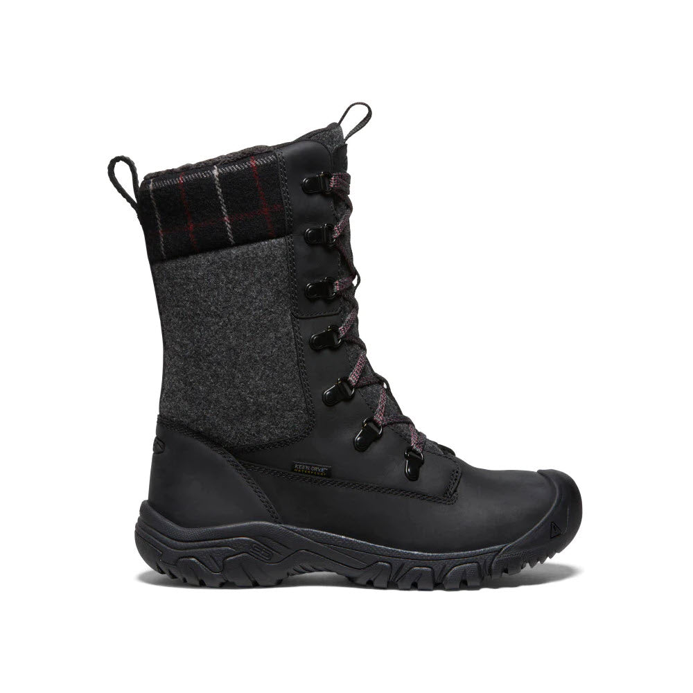 A single Keen Greta Tall Boot Black - Womens with plaid detailing, featuring a high ankle design, sturdy sole, and 200g insulation, isolated on a white background.