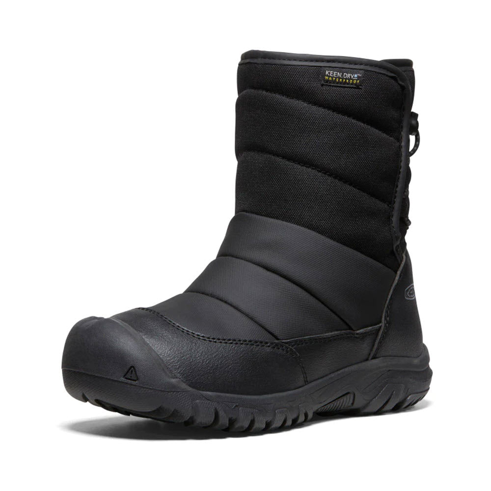 A black KEEN PUFFRIDER BLACK - KIDS snow boot with insulated upper and durable rubber sole, designed for cold weather.