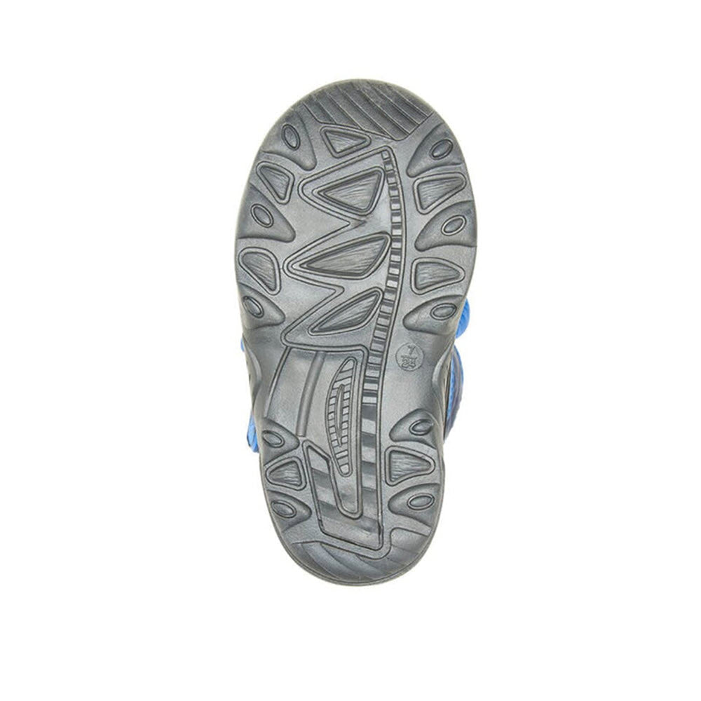 Bottom view of a gray and blue Kamik sports shoe sole featuring a tread pattern for grip, designed specifically for toddlers.