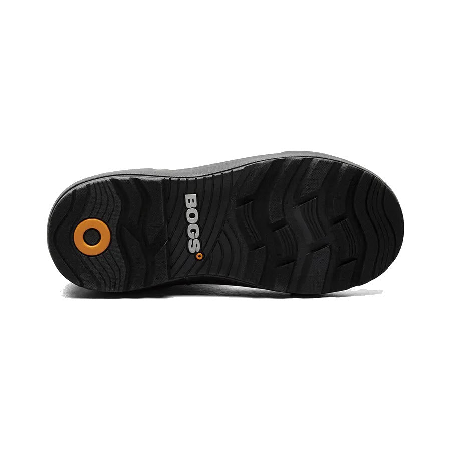Bottom view of a black Bogs winter boot sole with textured traction patterns and an orange circular logo reading &quot;bogs&quot;.