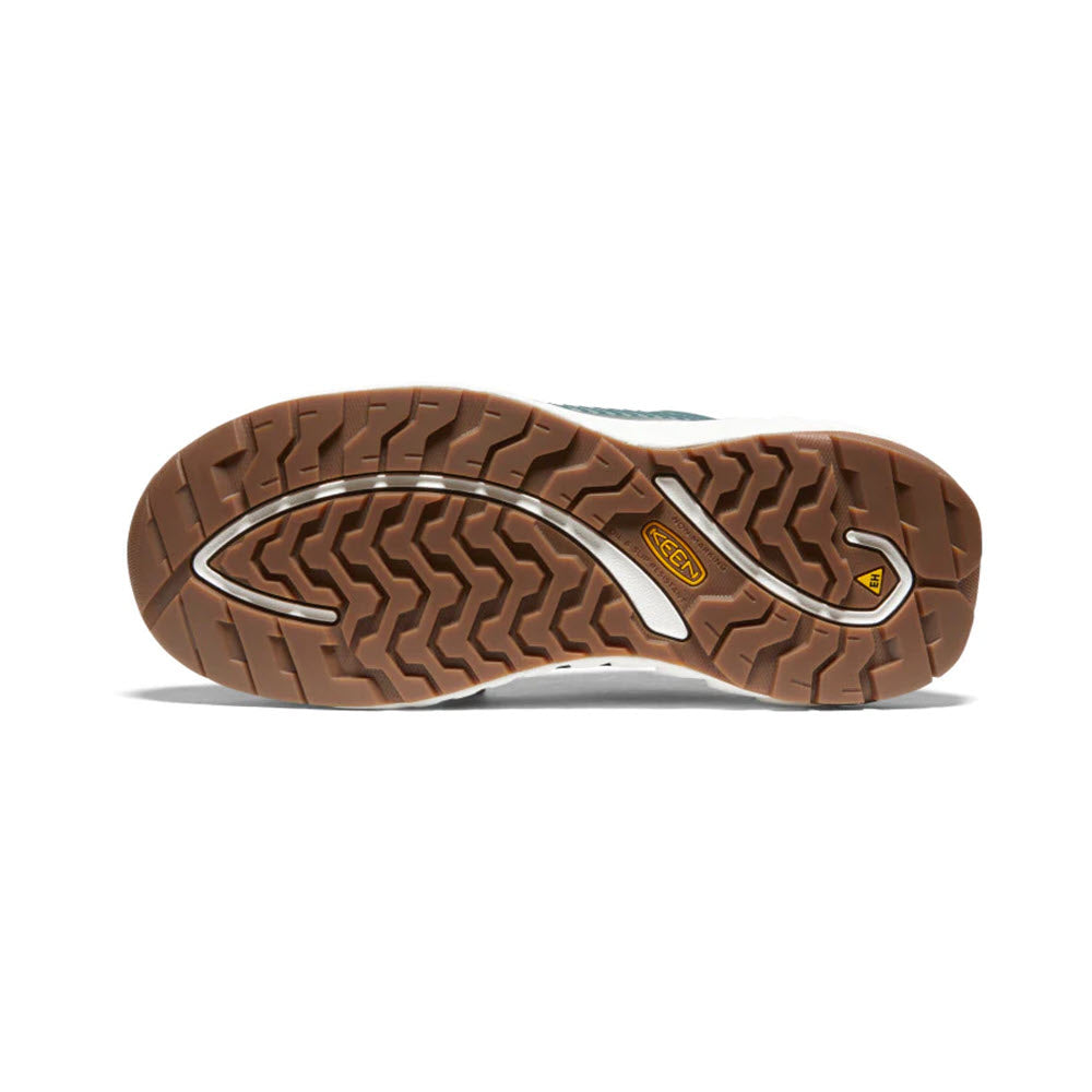 Sole of a Keen women&#39;s work sneaker displaying a deep tread pattern and the Keen logo.