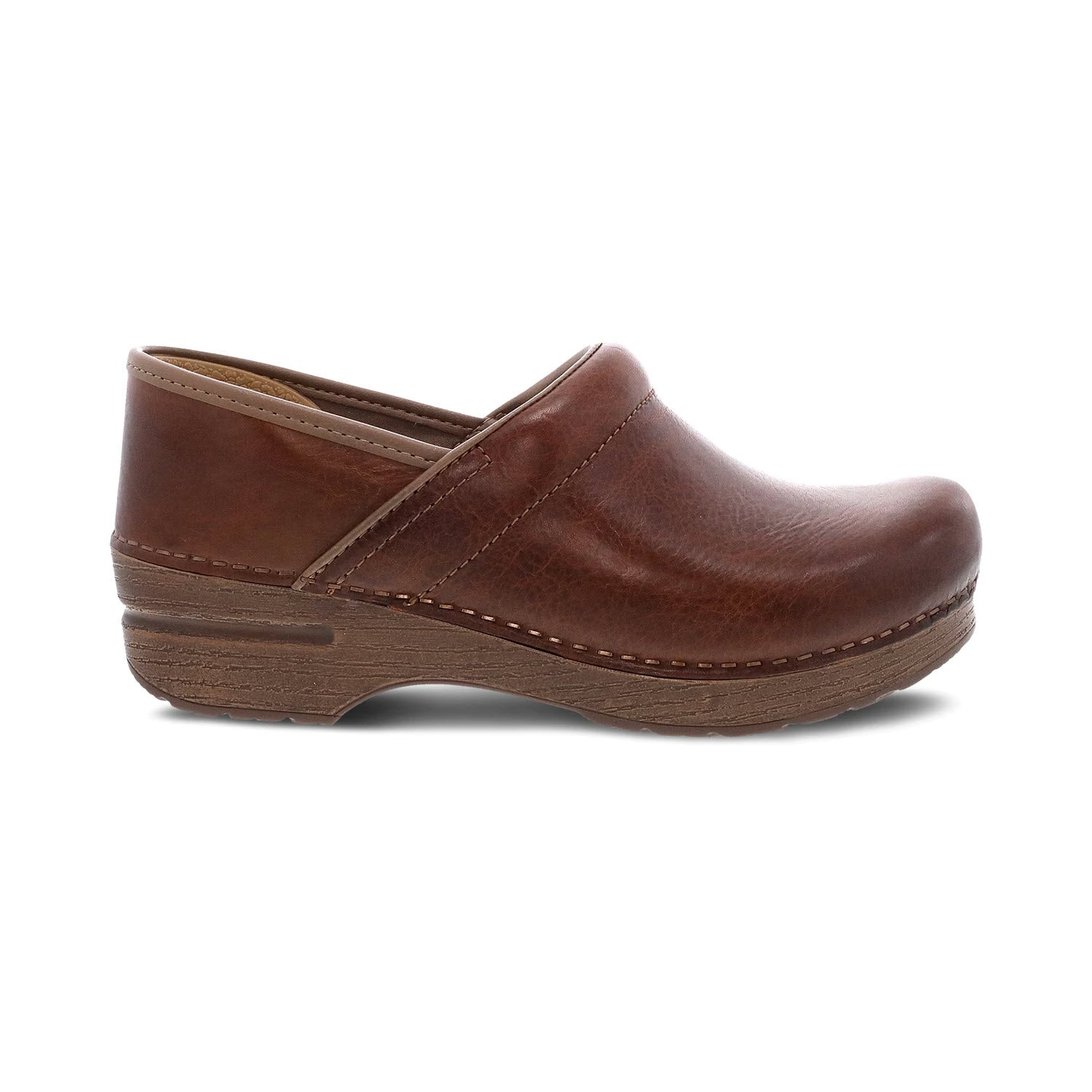 A brown leather Dansko Prof Saddle Full Grain clog on a white background, featuring a rounded toe and wooden heel.
