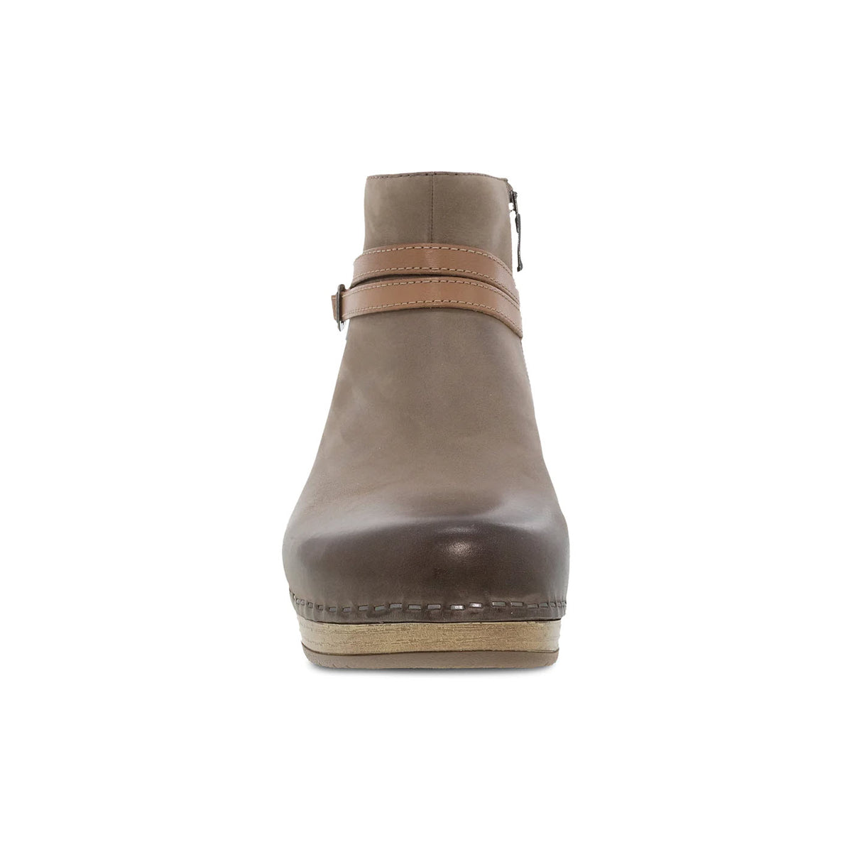 Side view of a Dansko Brook Taupe Burnished ankle bootie with a brown strap and low heel, isolated on a white background.