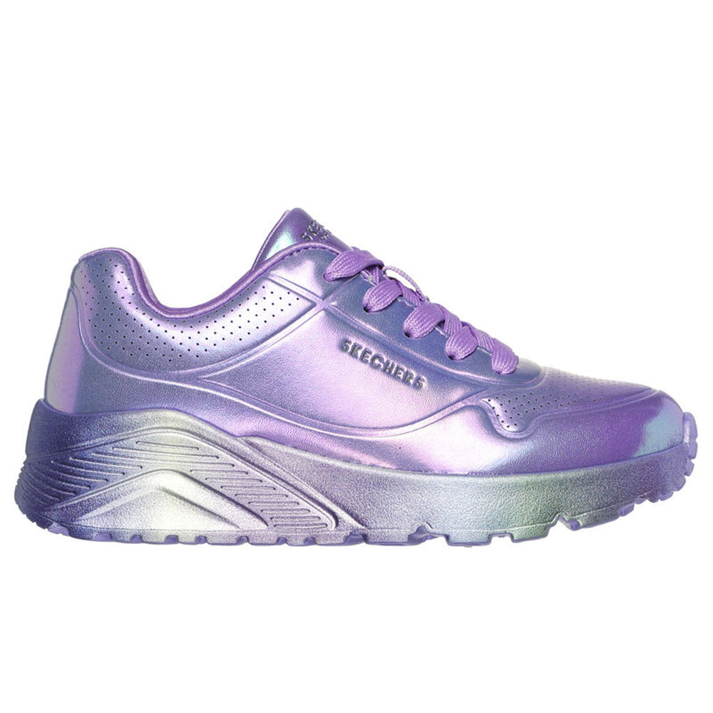 A Skechers UNO Lite Metallic Purple sneaker with white soles and the text "seegler" embossed on the side, isolated on a white background.