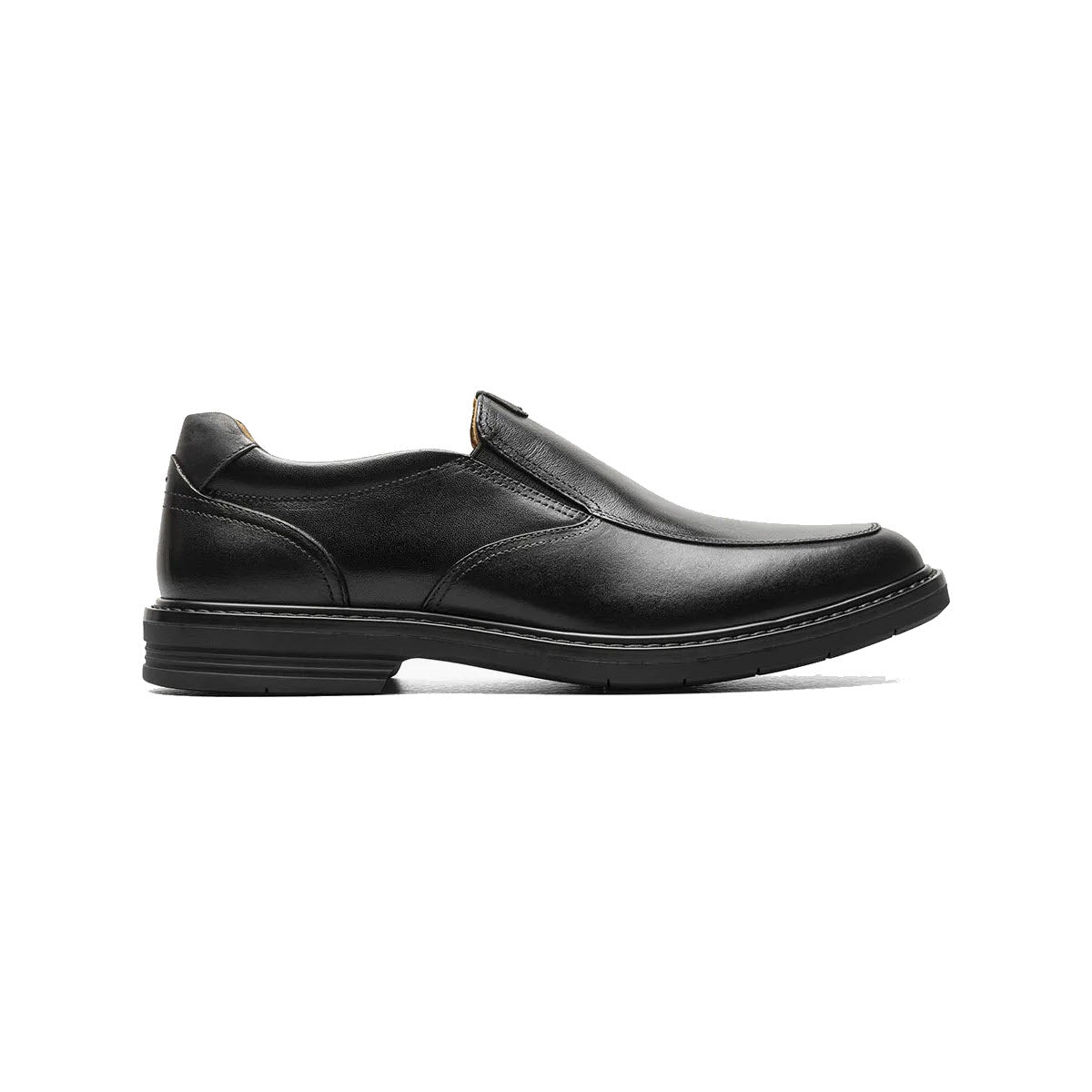 A single Florsheim FLORSHEIM NORWALK MOC TOE SLIP ON BLACK - MENS dress shoe with a low heel and elastic side panels, displayed against a white background.