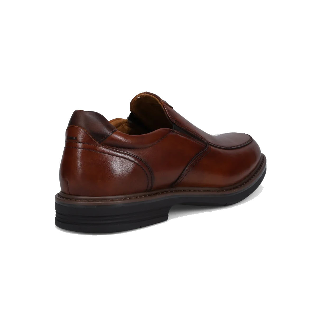 A single Florsheim Norwalk Moc Toe Slip On Cognac - Mens shoe with a black sole, displayed on a white background.