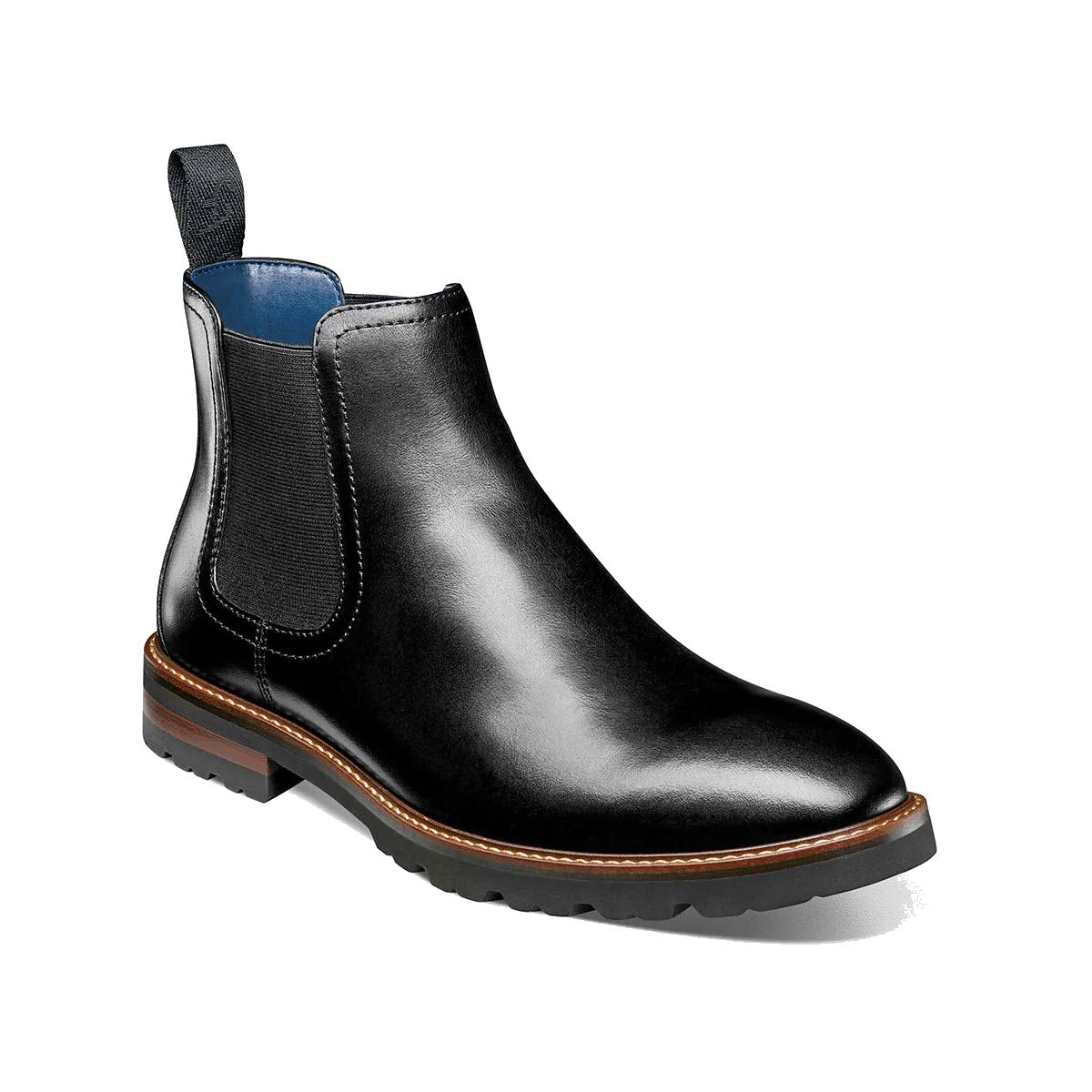 A black leather Florsheim RENEGADE PLAIN TOE GORE boot with elastic side panels, pull tab, and brown trim on a white background.