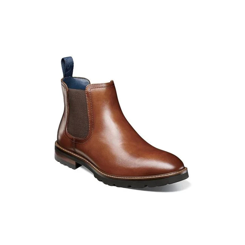 A single brown leather Florsheim Renegade plain toe gore cognac chelsea boot with elastic side panels and a pull tab on a white background.