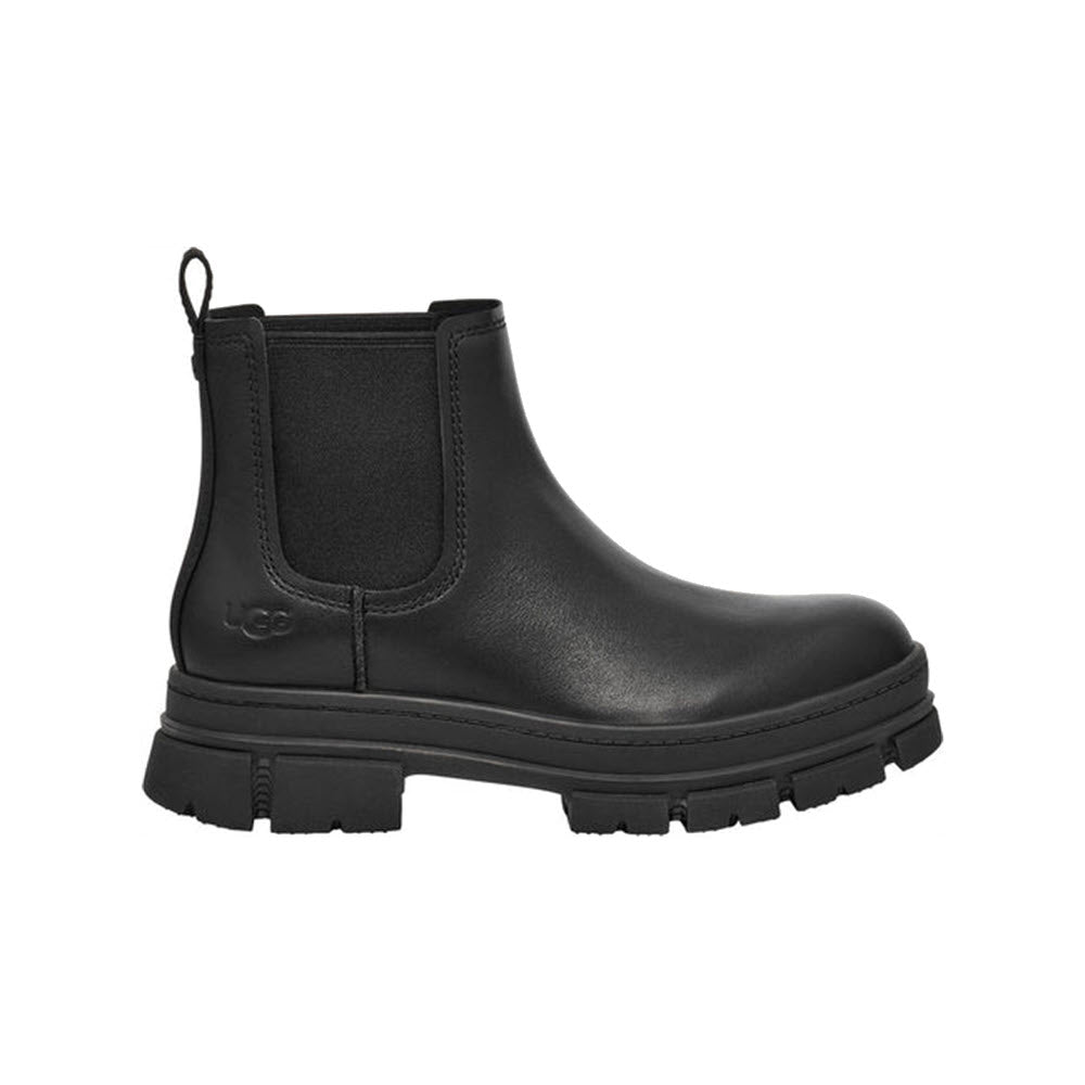 UGG Ashton Chelsea black boot with a robust sole and a pull loop at the back, isolated on a white background.