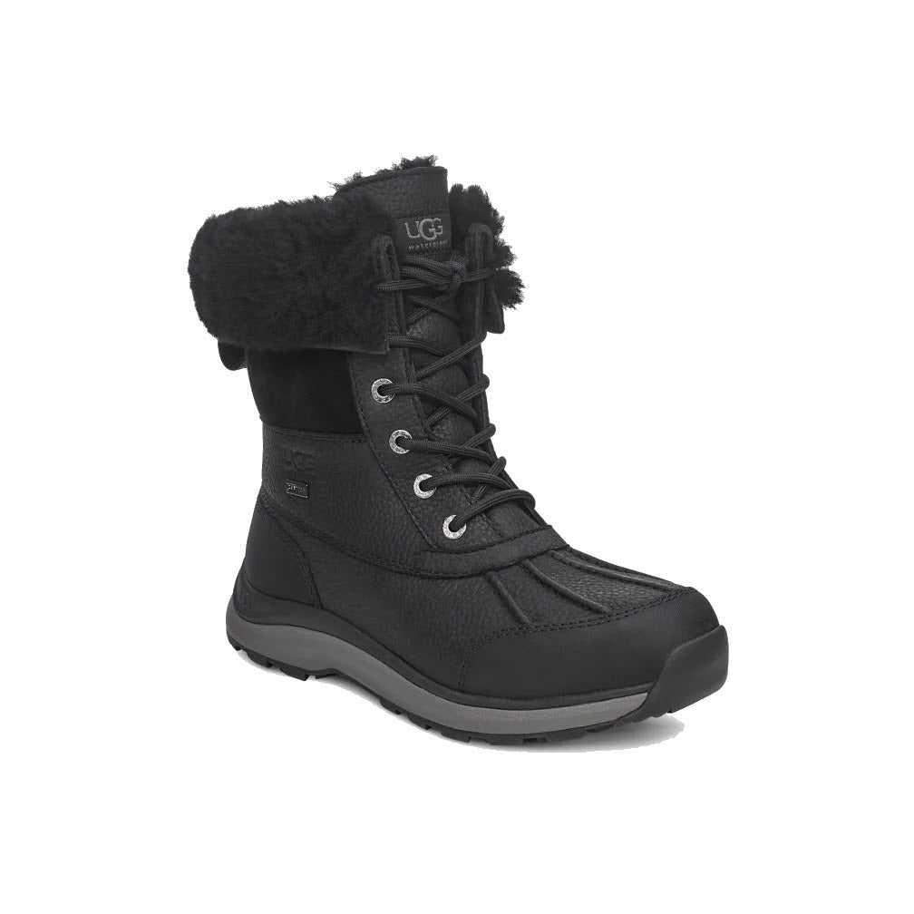 UGG Adirondack Boot III Black/Black winter boot with lace-up front and fur trim around the top.