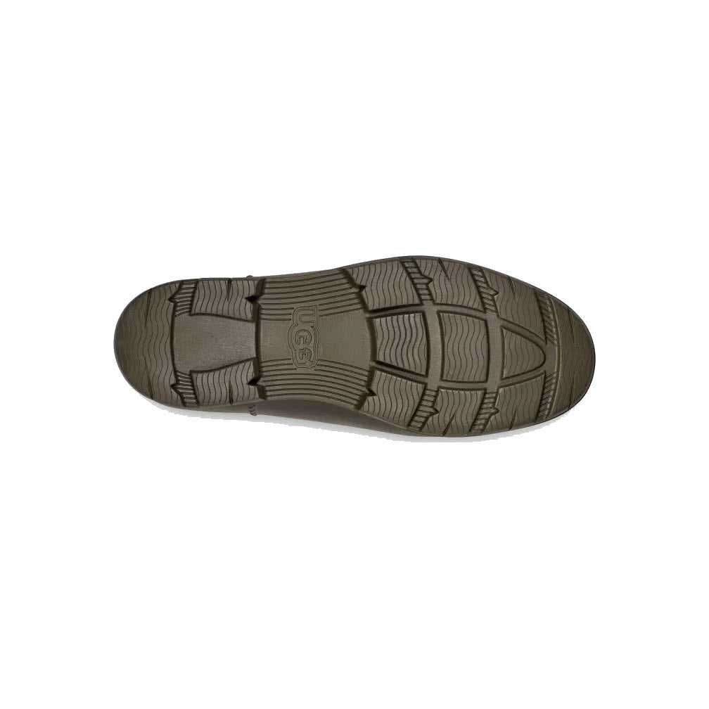 Sole of a UGG DROPLET FOREST NIGHT - WOMENS displaying a detailed tread pattern and Ugg logo.