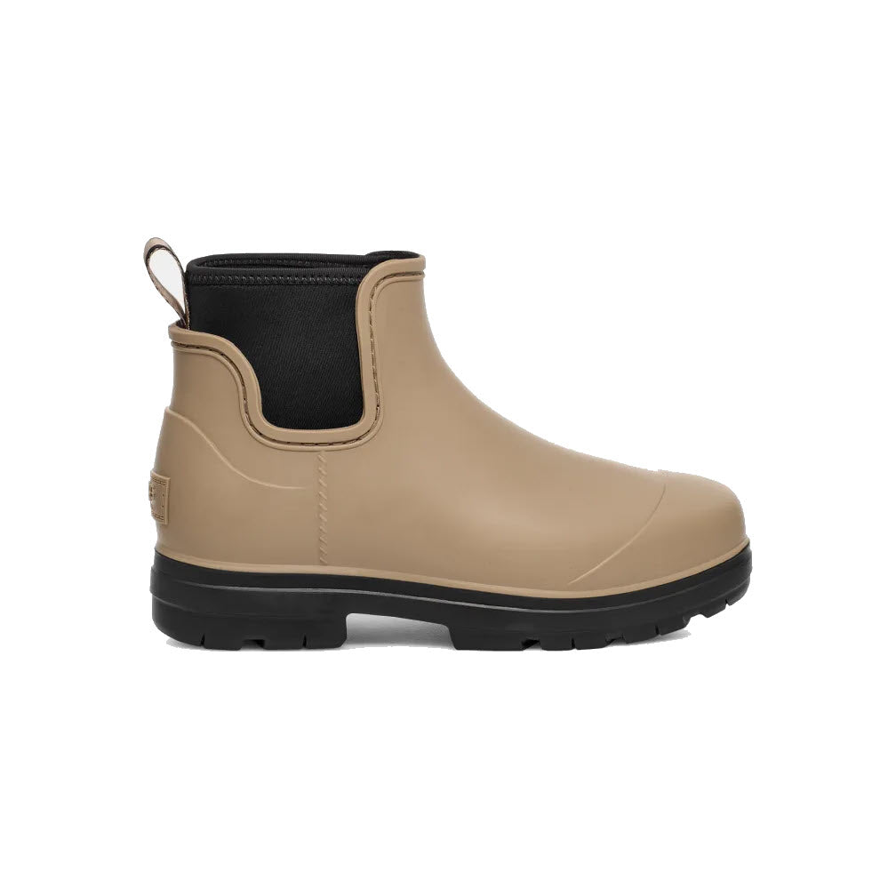 A UGG Droplet Taupe ankle boot with black elastic side panels and a durable rubber shell, viewed from the side.
