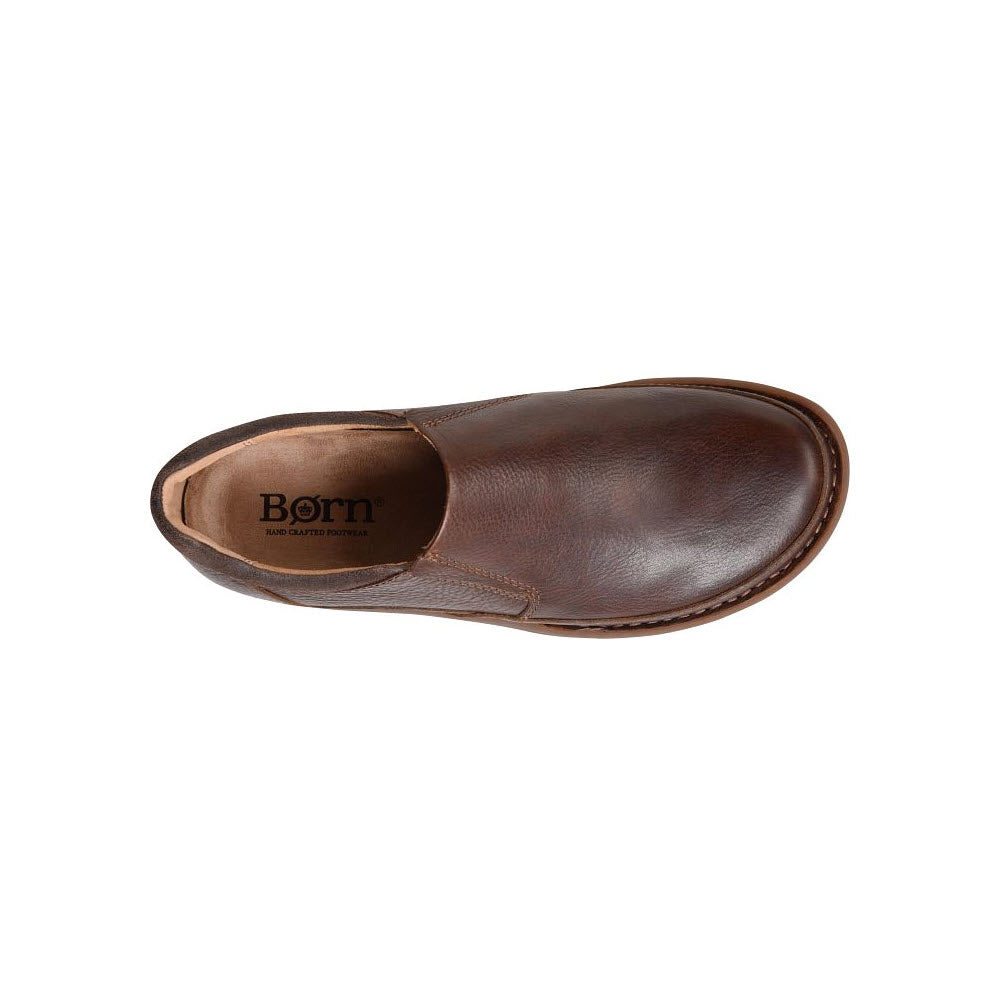 A single BORN NIGEL SLIP ON BROWN - MENS shoe from the Born brand, displayed against a white background.