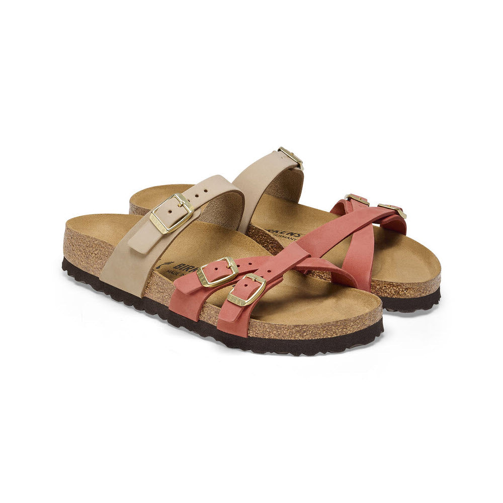 A pair of Birkenstock Franca Sandcastle/Mars Red Nubuck sandals with crisscrossed straps and a soft footbed, isolated on a white background.