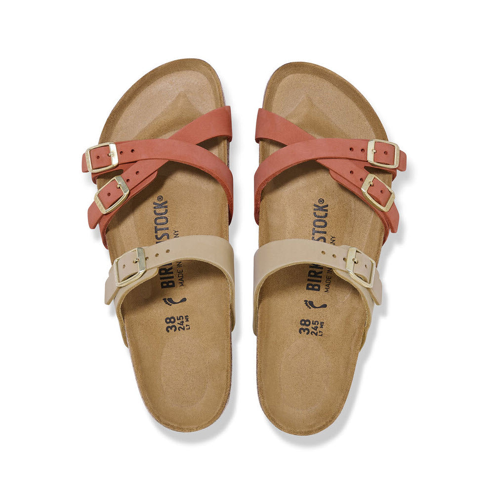 A pair of Birkenstock Franca Sandcastle/Mars Red Nubuck sandals with crisscrossed red and beige straps, viewed from above on a white background.