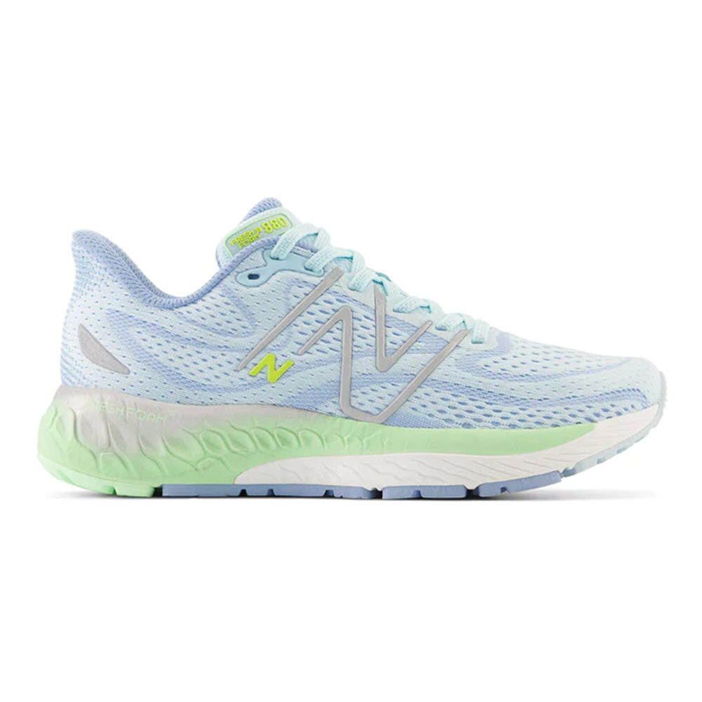 Sentence with replaced product:
Light blue New Balance Fresh Foam X 880v13 running shoe with green accents, prominently featuring the New Balance logo on the side.