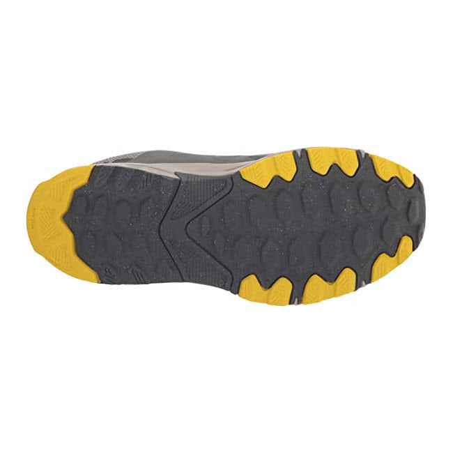 Sole of a trail running shoe featuring a gray and yellow New Balance 510v6 Rain Cloud AT Tread pattern for traction and durability.