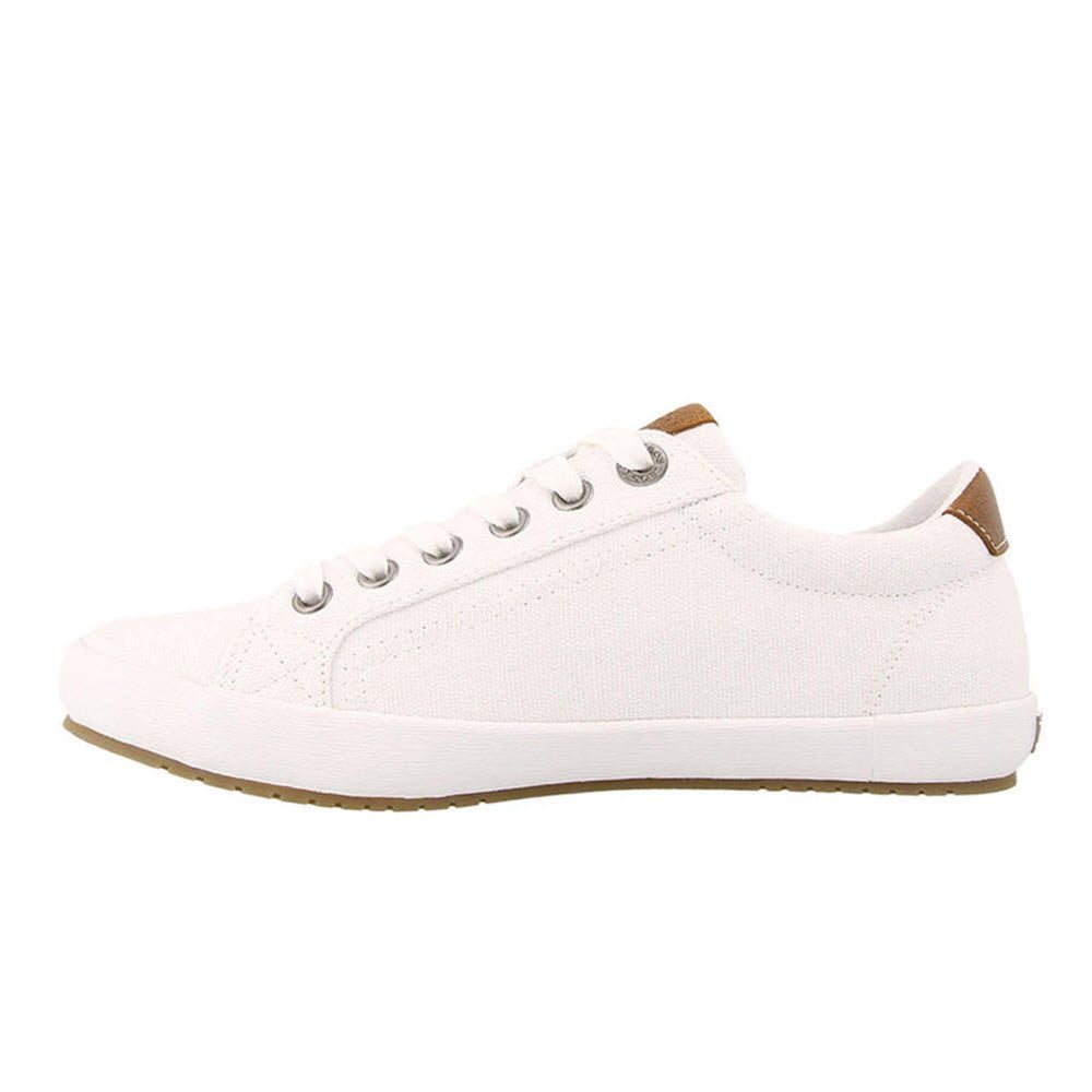 Side view of a Taos white running shoe with brown leather trim and silver eyelets on a white background.