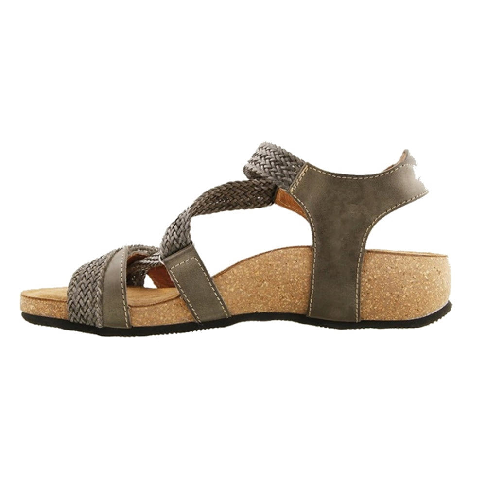 Side view of a Taos Trulie Dark Grey sandal with a cork-polyurethane footbed and braided details.
