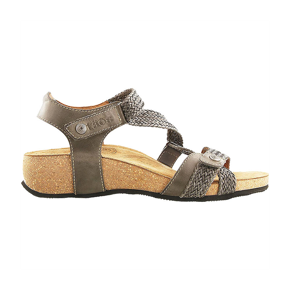 Side view of a Taos Trulie Dark Grey - Womens leather sandal with a cork sole and buckle details.