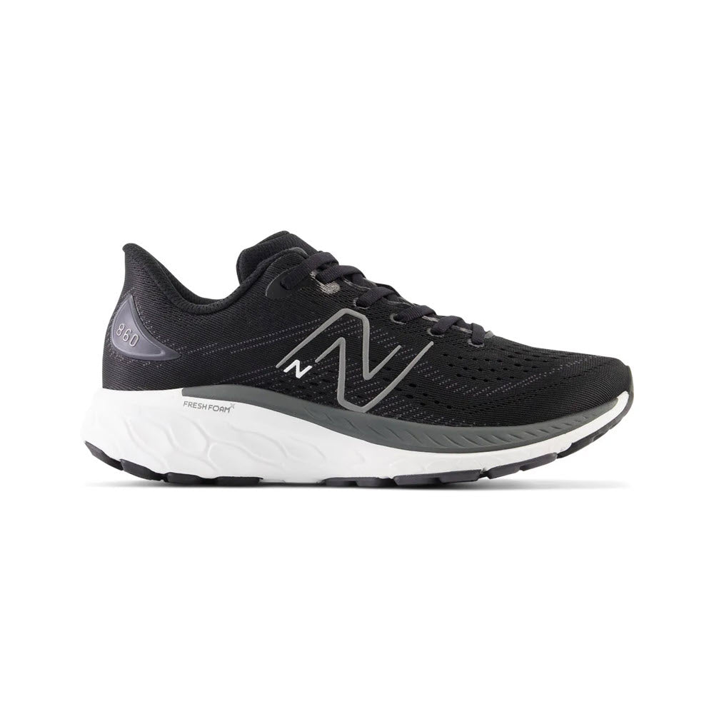 A black New Balance 860 V13 kids' running shoe with a white sole, featuring the logo on the side and "Fresh Foam X" technology.