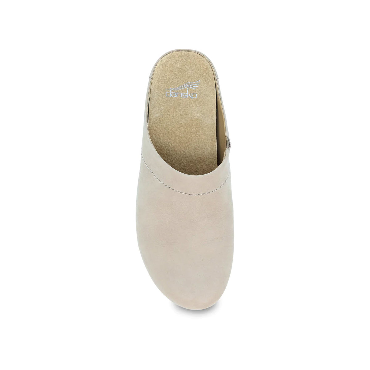 Top view of a light beige open-back clog with a smooth finish and a visible Dansko brand name on the insole.