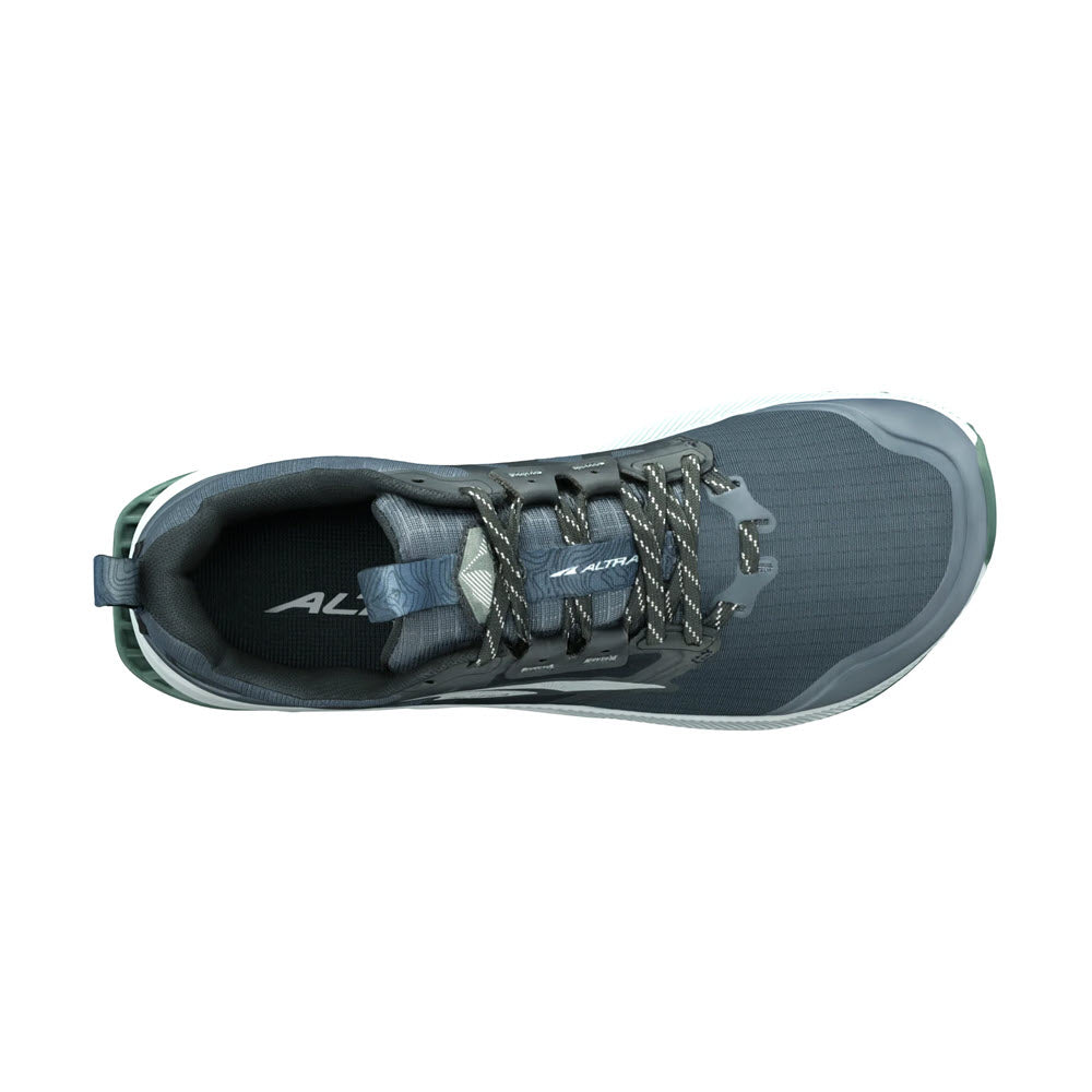 Top view of a gray Altra Lone Peak 8 running shoe with black and silver accents, featuring a lace-up closure and a rugged MaxTrac™ outsole design.