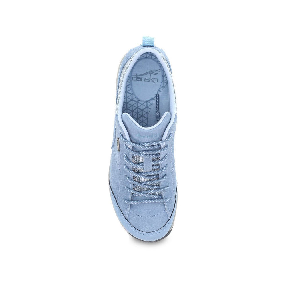 Top view of a single light blue Dansko Paisley Sky sneaker on a white background.