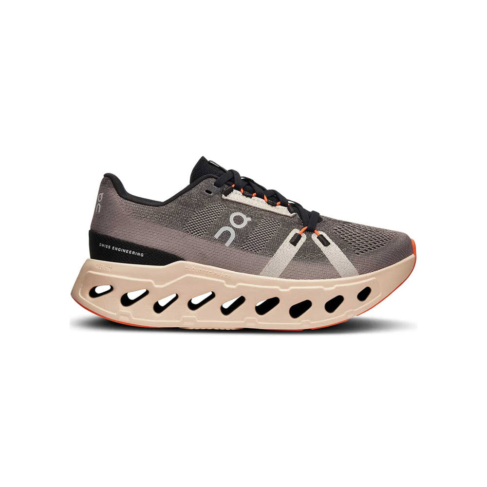 A single gray ON CLOUDECLIPSE FADE/SAND - WOMENS running shoe with a distinctive CloudTec sole, featuring large, hollowed-out design.