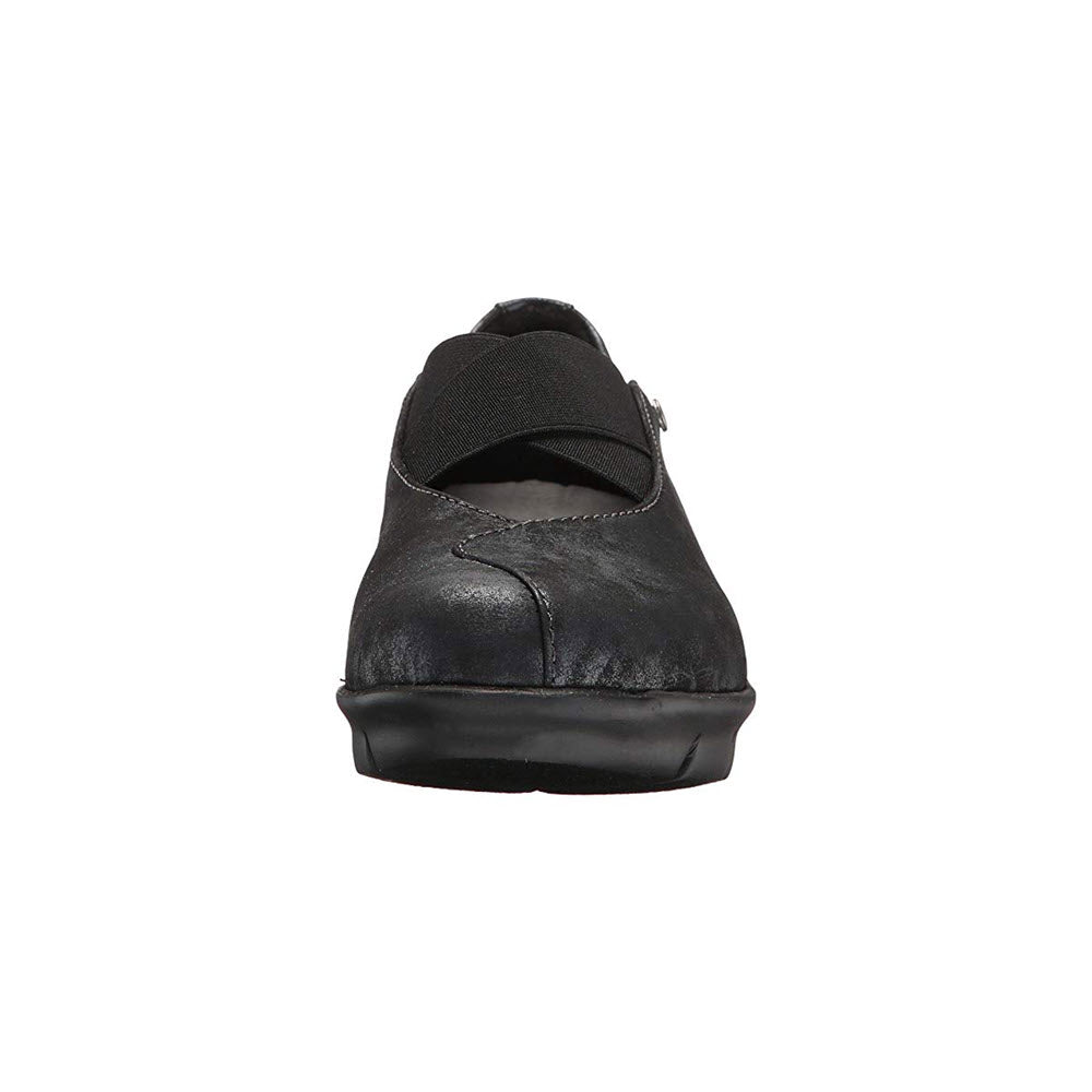Rear view of a Wolky black leather shoe with a velcro strap and thick, supportive rubber sole.