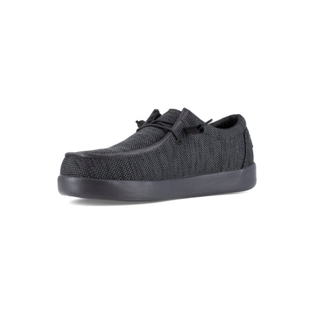 Single black Volcom casual sneaker with slip-resistant soles on a white background.