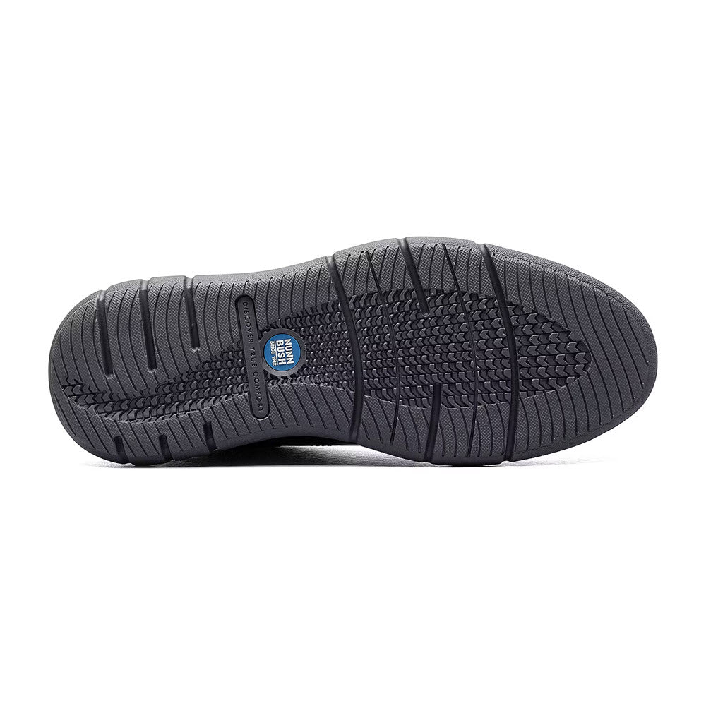 Black Nunn Bush sneaker sole with textured pattern and a BLOOM foam EVA insole, featuring a blue circular logo on the arch area.