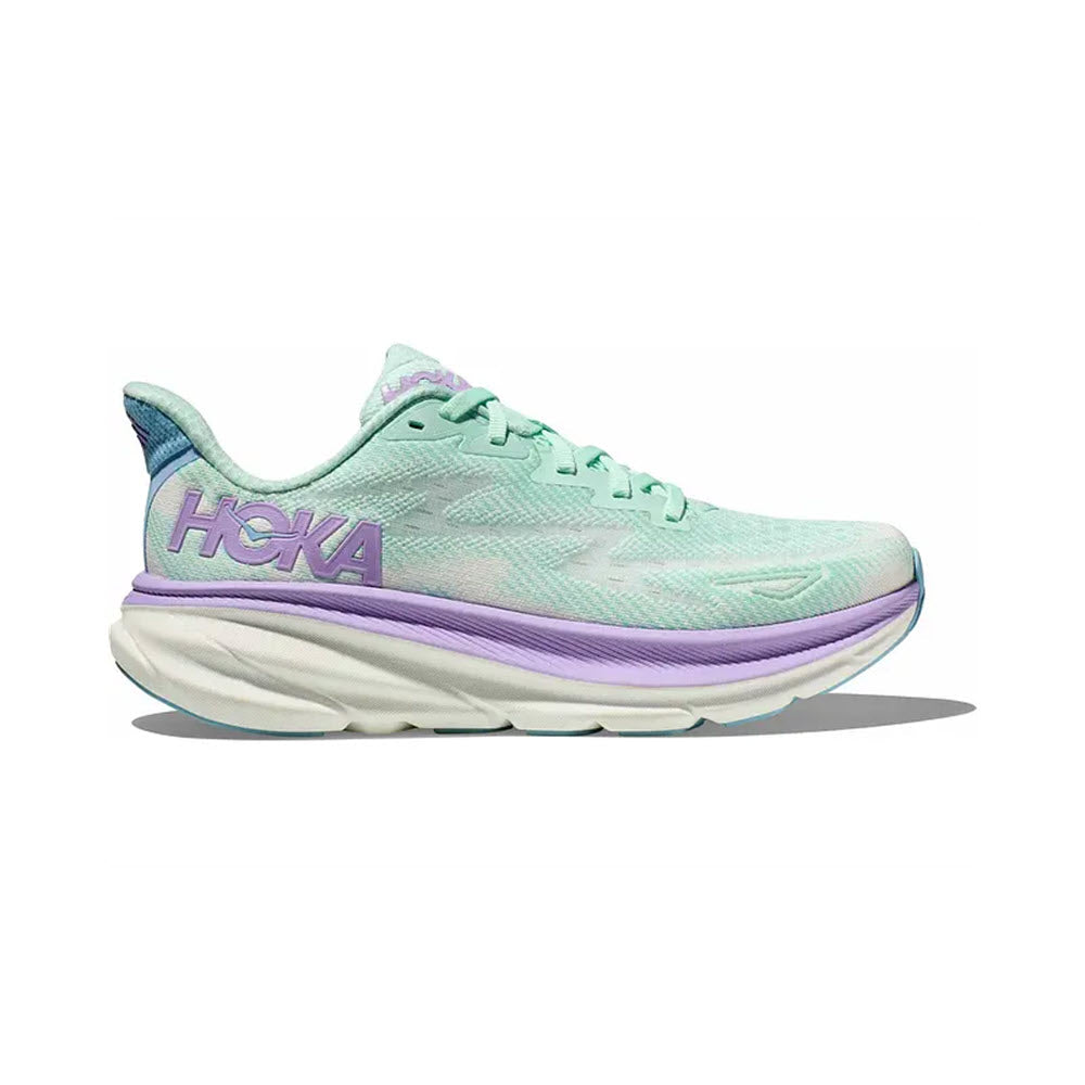 Light green and lavender Hoka Clifton 9 Sunlit Ocean/Lilac running shoe with a prominent sole and brand logo on the heel against a white background.