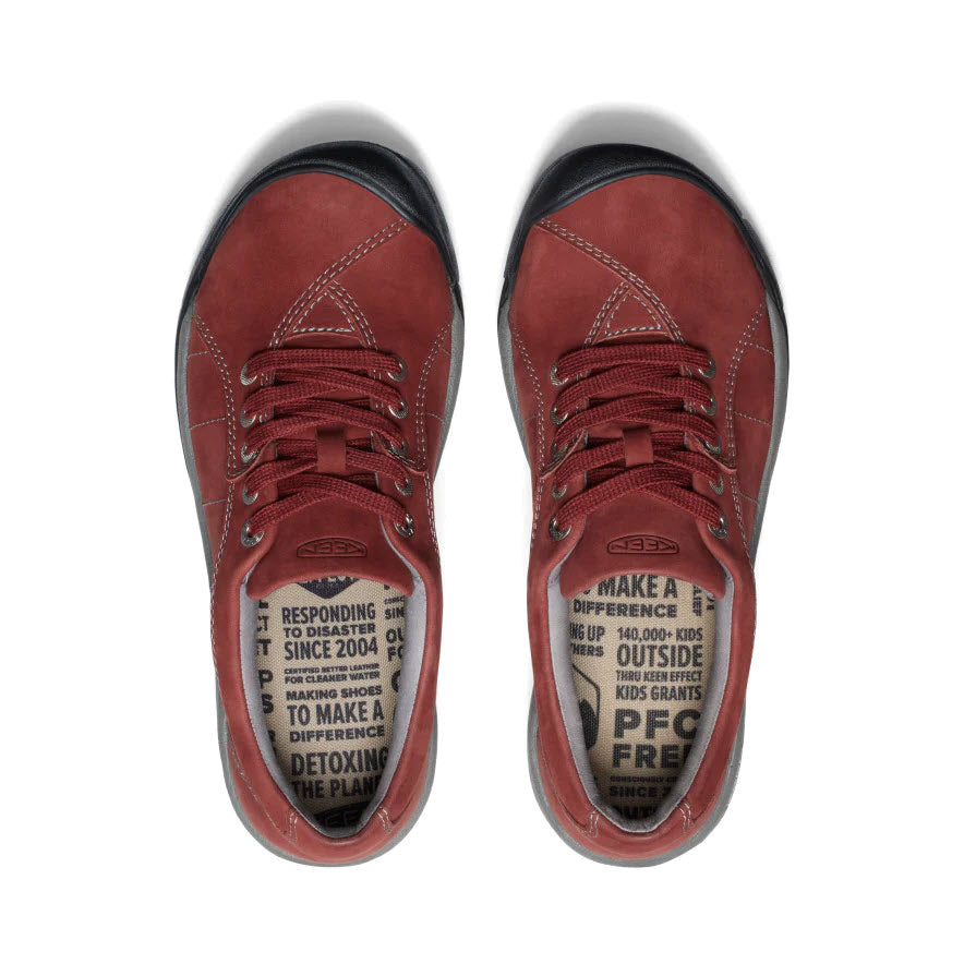A pair of KEEN PRESIDIO FIRED BRICK - WOMENS leather lace-up sneakers with text inside about making a positive impact and detoxifying the planet.